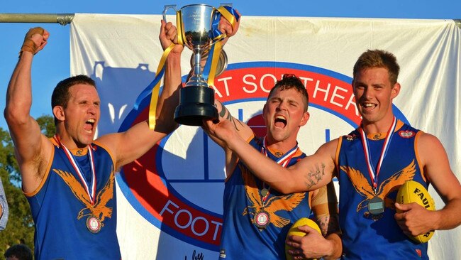 Tyson Neale (right) celebrates the 2013 Encounter Bay premiership. Picture: Encounter Bay Football Club