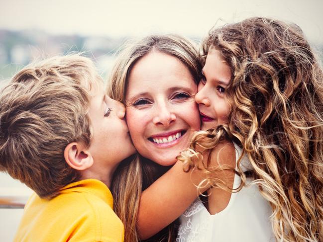 Real happy mother with her kids