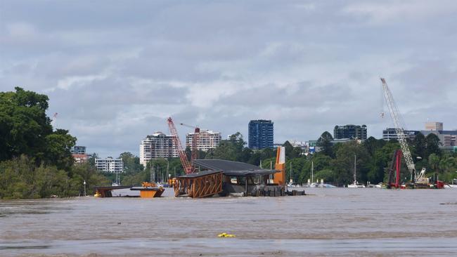 A huge crane threatens Howard Smith Wharves after breaking some of its moorings. Picture: Amanda Parkinson