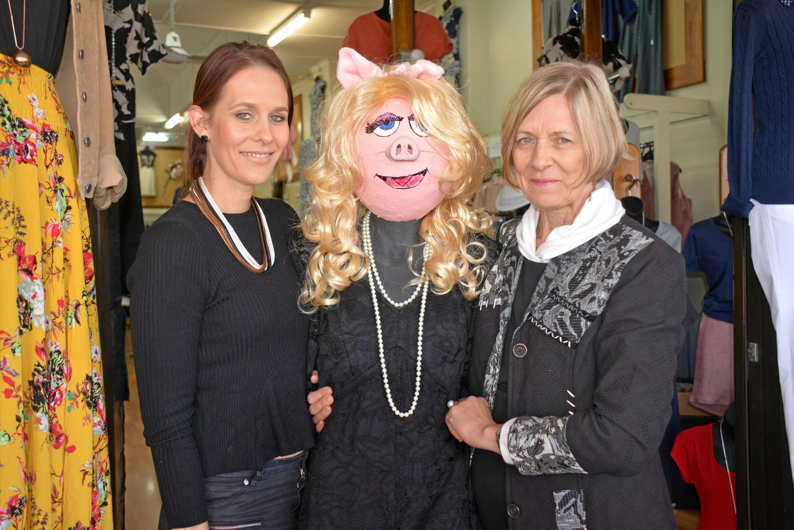 STYLISH: Kingaroy Trendsetter Boutique's Leah Kenny, Miss Piggy and Ev Kenny accept their highly commended in the  Kingaroy BaconFest Street Window competition. Picture: Jessica McGrath