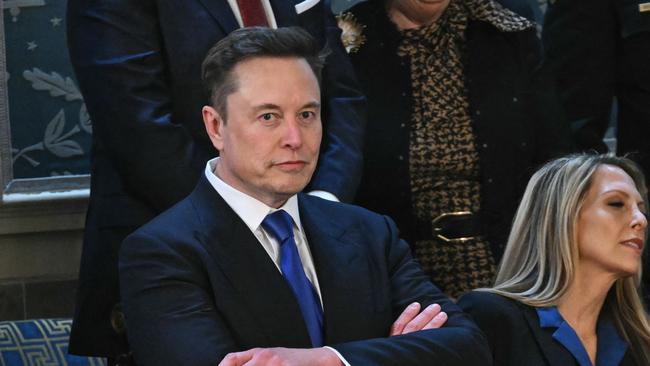 Elon Musk arrives for US President Donald Trump's address to a joint session of Congress. Picture: AFP.