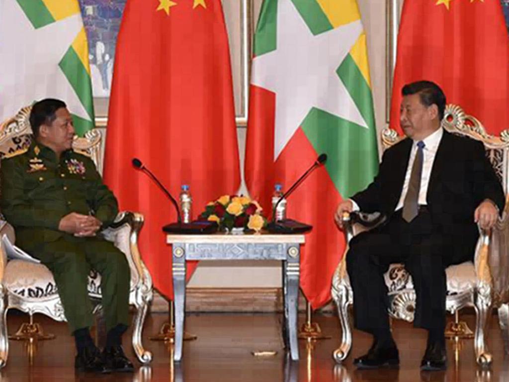 Myanmar's army chief, Senior General Min Aung Hlaing (L) speaking with Chinese President Xi Jinping, during their meeting. Picture: AFP Photo