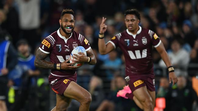 Cairns junior Hamiso Tabuai-Fidow strides towards the try line in the Maroons 38-10 victory over the Blues on Wednesday night. Picture: NRL Photos