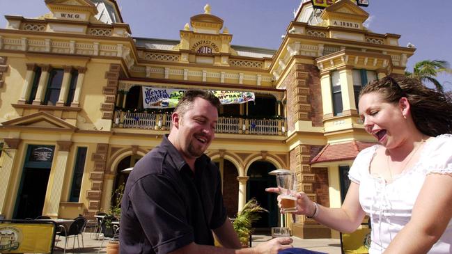 James Cruickshank and Elane Mercurio enjoy a beer at the Breakfast Creek Hotel in December 2002. Picture: Patrick Hamilton.