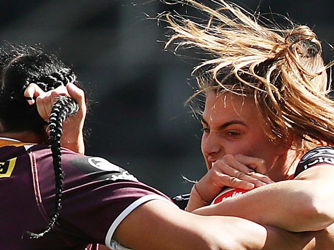 SYDNEY, AUSTRALIA - SEPTEMBER 15: Jessica Sergis of the Dragons is tackled during the round one NRLW match between the St George Illawarra Dragons and the Brisbane Broncos at Bankwest Stadium on September 15, 2019 in Sydney, Australia. (Photo by Mark Metcalfe/Getty Images)