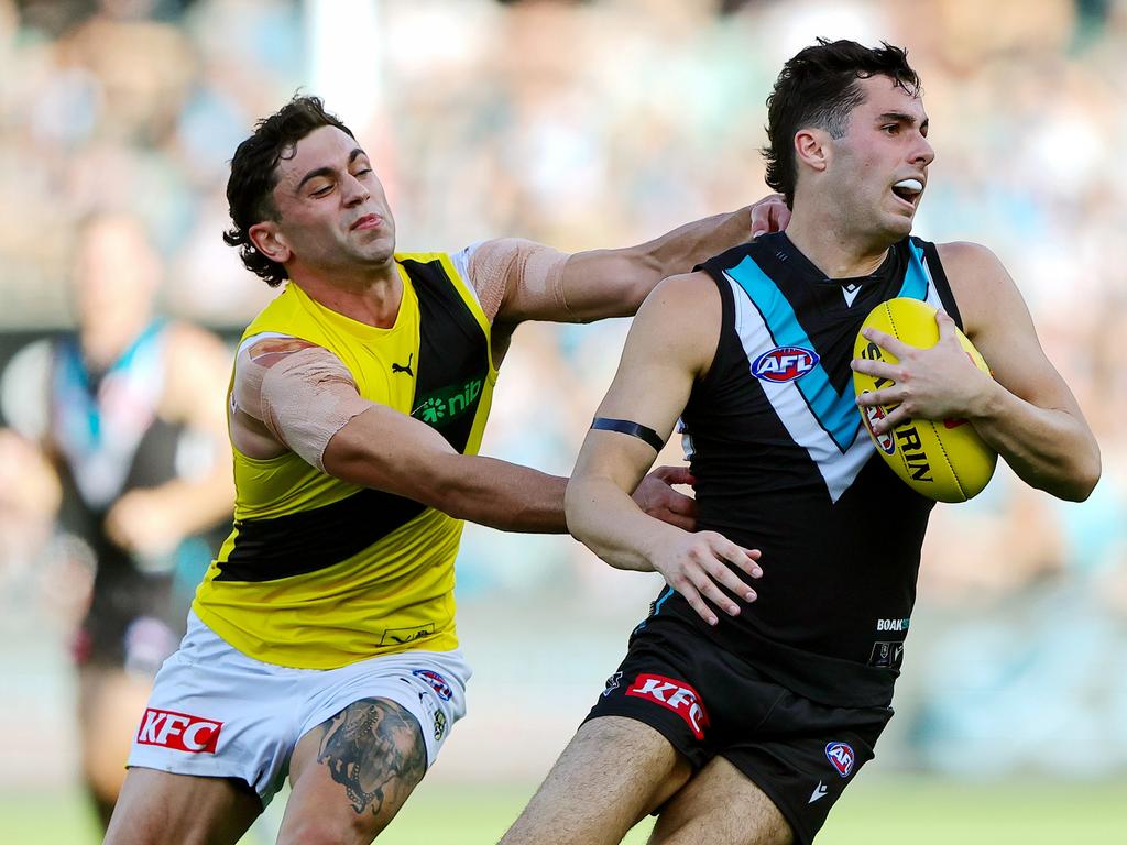 Tim Taranto (left) copped some heat from the Tiger faithful. (Photo by Sarah Reed/AFL Photos via Getty Images)