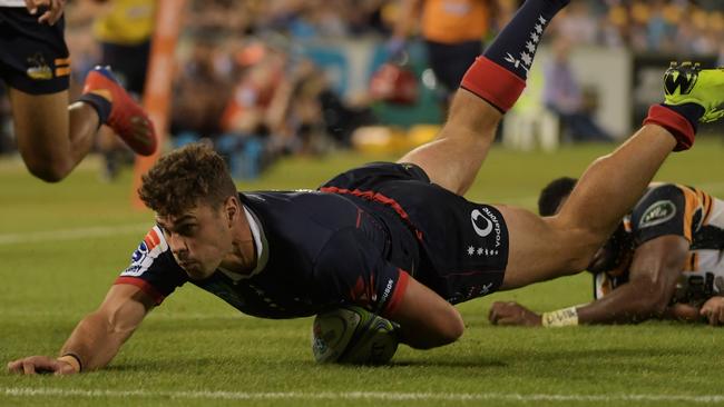 Jack Maddocks of the Rebels drops the ball as he dives for a try. Picture: Tracey Nearmy/Getty Images