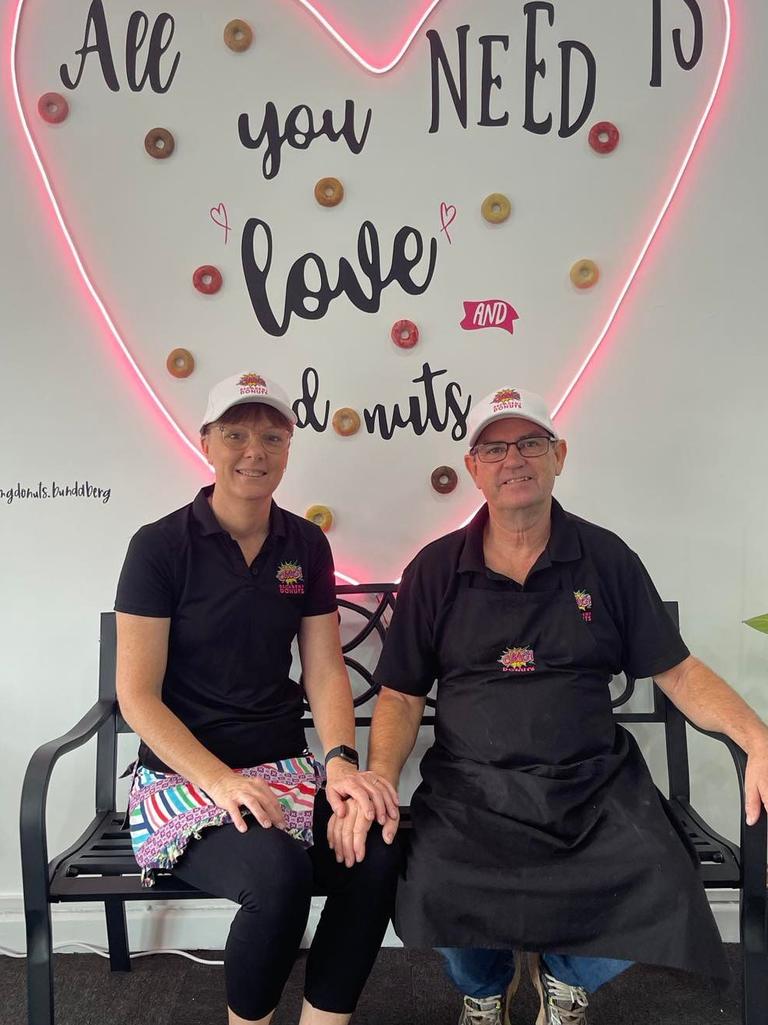 Kerry and Peter Blake of OMG Decadent Donuts Bundaberg, with new storefront decorations.