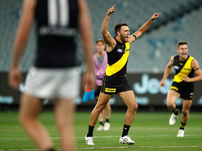 MELBOURNE, AUSTRALIA - MARCH 19: Shane Edwards of the Tigers celebrates a goal during the 2020 AFL Round 01 match between the Richmond Tigers and the Carlton Blues at the Melbourne Cricket Ground on March 19, 2020 in Melbourne, Australia. (Photo by Dylan Burns/AFL Photos via Getty Images)