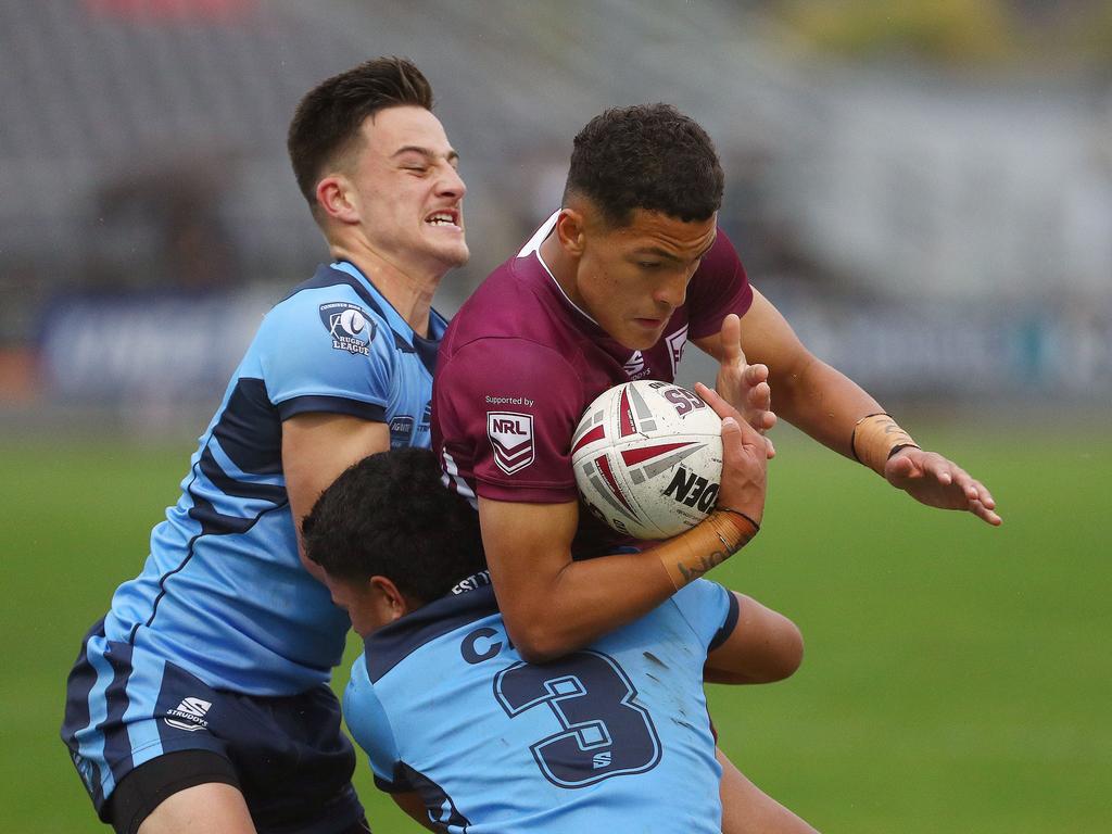 Action from the Australian state schools national rugby league championship match between Queensland Maroon and NSW CHS. QLD’s Jared Horne attacks. Picture: Tertius Pickard