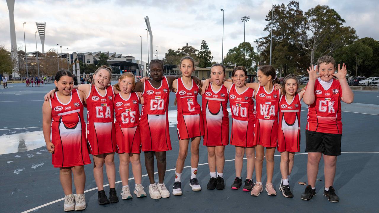 Corio under-11 netball team pull their funniest faces.