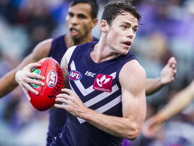 Lachie Neale of the Fremantle Dockers during the Round 9 AFL match between the Fremantle Dockers and Carlton at the Domain Stadium in Perth, Sunday, May 21, 2017. (AAP Image/Tony McDonough) NO ARCHIVING, EDITORIAL USE ONLY