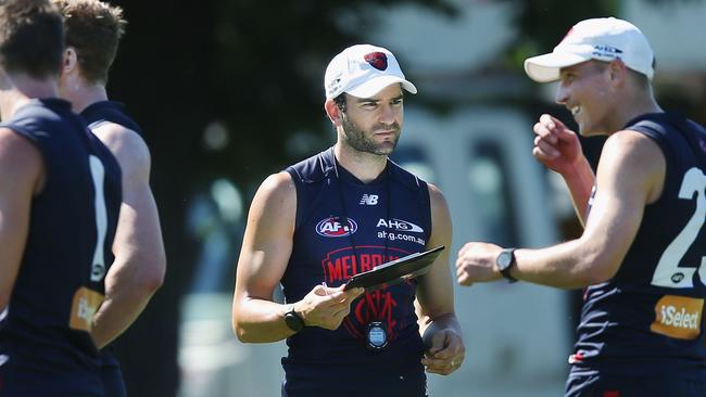 Jordan Lewis works with Bernie Vince and the Dees’ backline. Picture: Getty Images