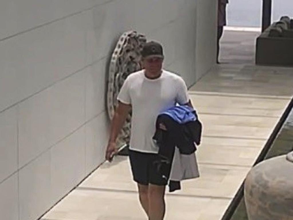 Shane Warne is pictured on CCTV footage returning to his Samujana Villa in Koh Samui on Friday March 4.