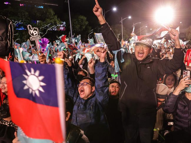 Supporters of Taiwan People's Party (TPP) presidential candidate Ko Wen-je wait for the results of the presidential election at the TPP headquarters in Xinzhuang in New Taipei City. Picture: I-Hwa Cheng / AFP