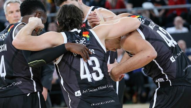 Things looked grim when Chris Goulding was helped from the court. Picture: George Salpigtidis