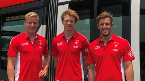 Isaac Heeney, Callum Mills and Luke Parker promoting the new travel deals.