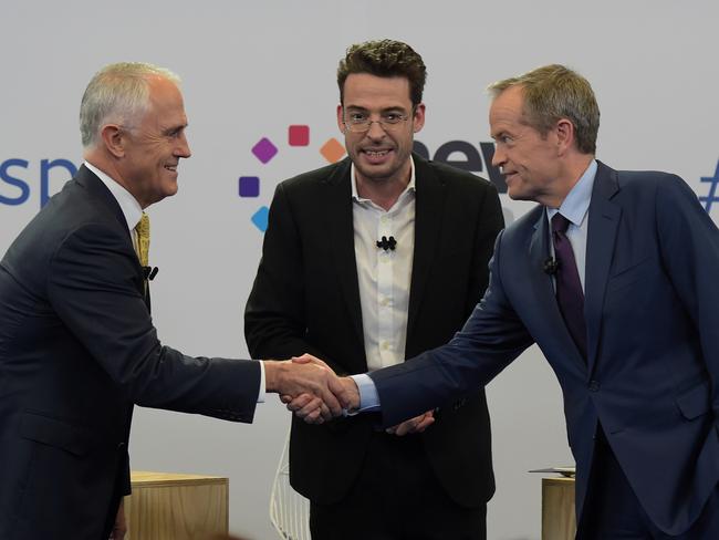 Malcolm Turnbull and Bill Shorten shake hands after the debate. Picture: Lukas Coch