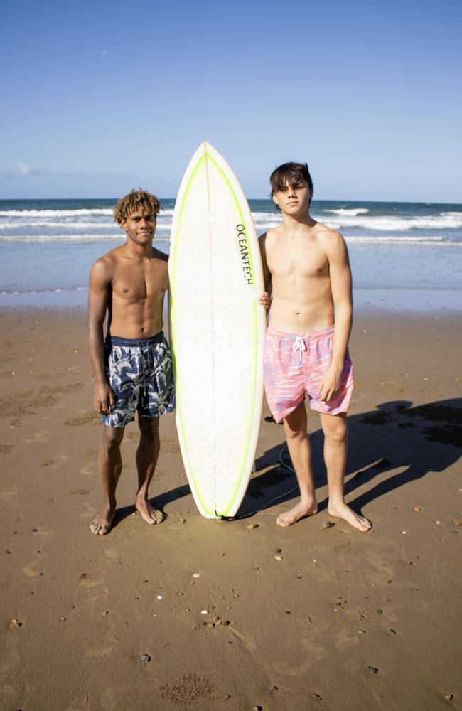 Surfers Joseph Richards (left) and Levi Luttrell (right) recall the moment a young shark bite victim called out for help.