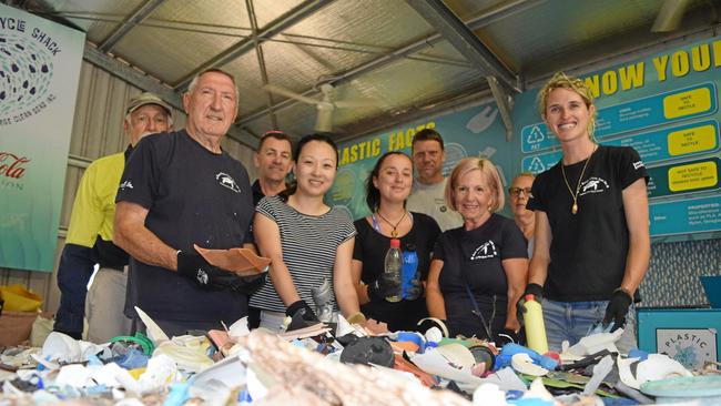 Sorting through rubbish collected on an Eco Barge Clean Seas trip are volunteers (front, from left) Richard Scott, Sophie Qian, Sam Houghton and Margi Mills, project co-ordinator Fiona Broadbent, and (back) volunteers Brian Fry, Nick Beecroft, Sam King and June Whitney. Picture: Monique Preston