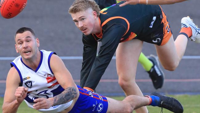 Football GDFL Round 11 : Geelong West v Bell Post Hill. Geelong West 1 watches Bell Post Hill 18 Sam Quinn handball Picture: Mark Wilson