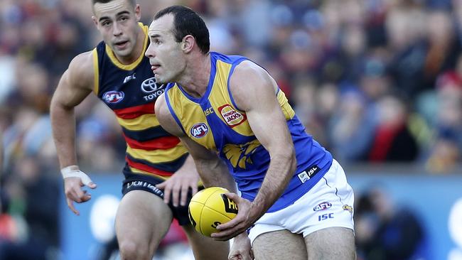 Shannon Hurn looks to pass with Myles Poholke behind. Picture: Sarah Reed