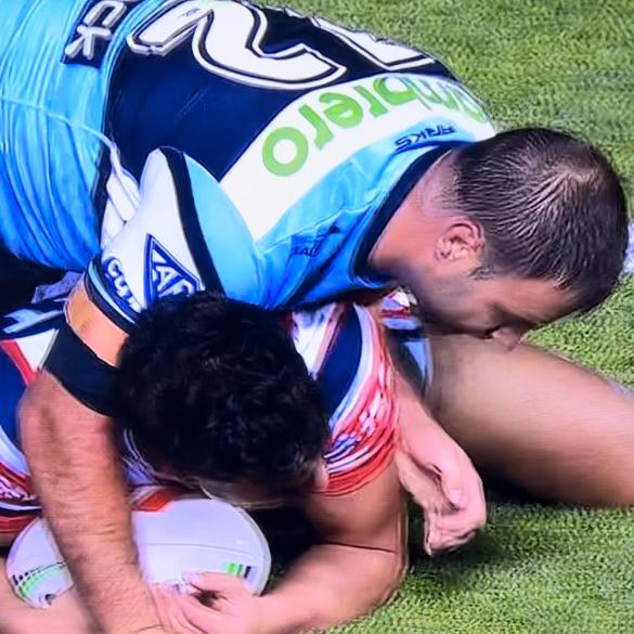 Wade Graham collects Joseph-Aukuso Suaalii. Pic: Fox League