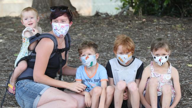 Skye Mundy of Port Wakefield with children Jye, 8, Tilly, 6, Logan, 5, and Aurora, 19 months wait for a COVID test at Gawler Sport and Community Centre on Friday. Picture: Tait Schmaal