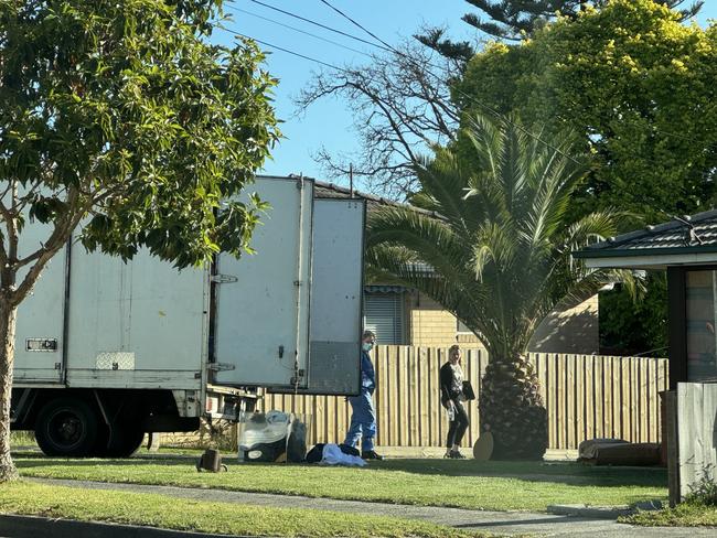 Police search a truck parked outside a property in Mulgrave as part of their investigation. Picture: Supplied