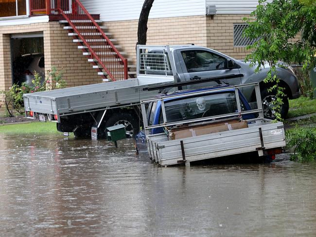 Flood vehicles in Logan Ave, Oxley. Picture: Marc Robertson