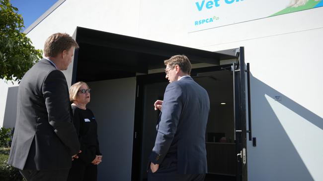 Toowoomba mayor Geoff McDonald, RSPCA chief vet officer Anne Chester and chief executive Darren Maier tour the organisation's new Banks Vet Clinic at its Wellcamp site.