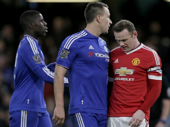 Chelsea's John Terry, left, stands next to Manchester United's captain Wayne Rooney.