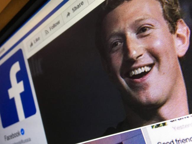 A picture taken in Moscow on March 22, 2018 shows an illustration picture of the English language version of Facebook about page featuring the face of founder and CEO Mark Zuckerberg. A public apology by Facebook chief Mark Zuckerberg, on March 22, 2018 failed to quell outrage over the hijacking of personal data from millions of people, as critics demanded the social media giant go much further to protect privacy. / AFP PHOTO / Mladen ANTONOV