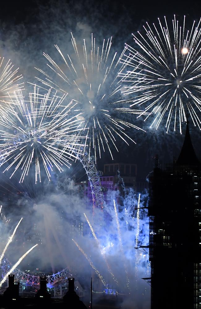 Fireworks explode over The Coca-Cola London Eye, Westminster Abbey and Elizabeth Tower near Parliament. Picture: Getty