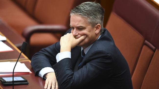 Finance Minister Mathias Cormann reacts during debate on company tax cuts. Picture: AAP.