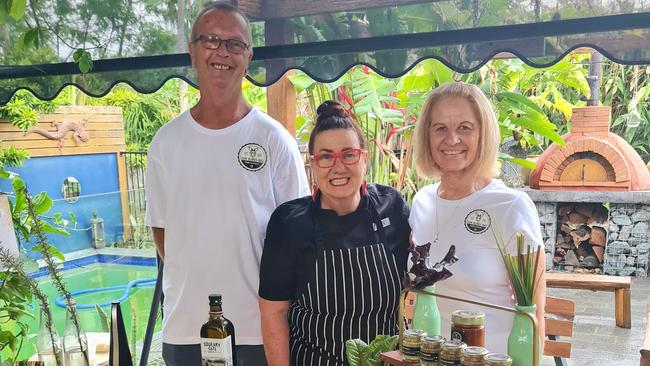 Daryl McCann’s barbecue spices were popular across the southeast. He is pictured with celebrity chef Jan Cranitch, centre, and his wife Debra. Picture: Contributed