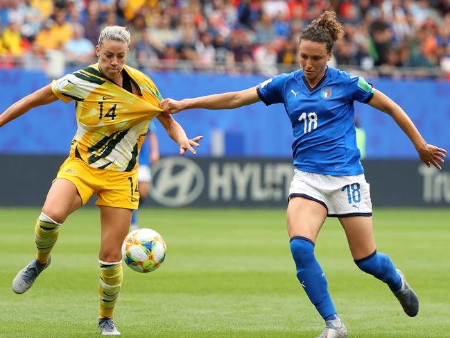 VALENCIENNES, FRANCE - JUNE 09: Alanna Kennedy of Australia is held by Ilaria Mauro of Italy during the 2019 FIFA Women's World Cup France group C match between Australia and Italy at Stade du Hainaut on June 09, 2019 in Valenciennes, France. (Photo by Robert Cianflone/Getty Images)