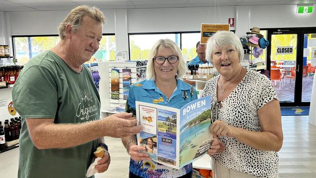 Bowen Tourism and Business manager Leanne Abernethy (centre), with visitors John and Julie Omrod from Orange in NSW. Picture: Contributed