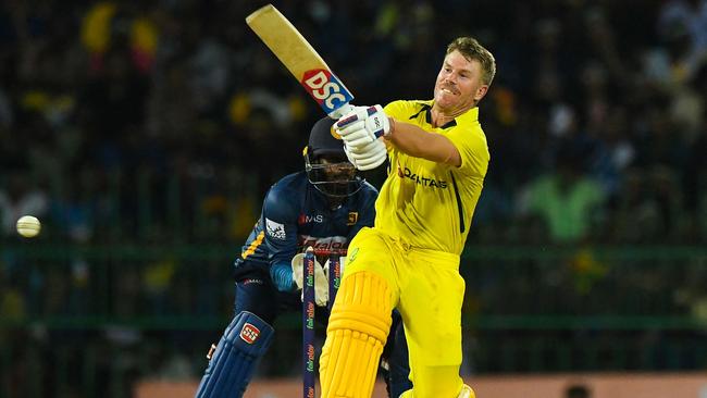 Australia's David Warner is on the wish-list for Ricky Ponting as a potential signing for the Hobart Hurricanes. (Photo by ISHARA S. KODIKARA / AFP)