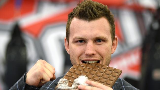 Jeff Horn bites into a piece of choc-olate. Picture: AAP