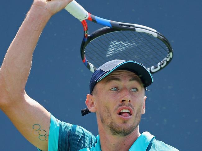 NEW YORK, NY - AUGUST 31: John Millman of Australia returns a shot against Malek Jaziri of Tunisia during their second round Men's Singles match on Day Four of the 2017 US Open at the USTA Billie Jean King National Tennis Center on August 31, 2017 in the Flushing neighborhood of the Queens borough of New York City.   Richard Heathcote/Getty Images/AFP == FOR NEWSPAPERS, INTERNET, TELCOS & TELEVISION USE ONLY ==