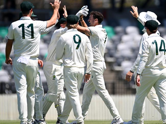 Jordan Buckingham celebrates a wicket with his Australia A teammates. Picture: Albert Perez/Getty Images