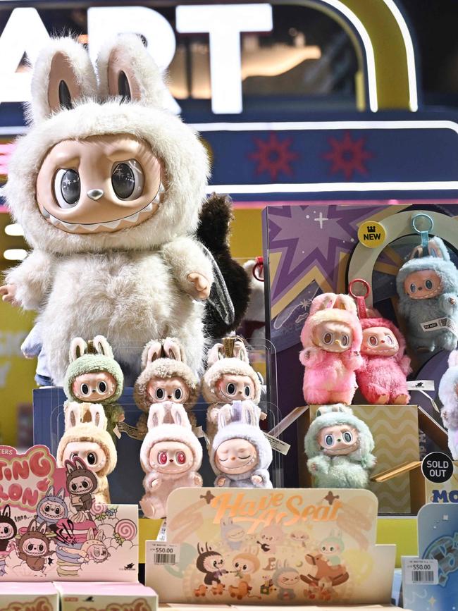 Labubu have become Gen Z’s go-to bag accessory. (Photo by Lillian SUWANRUMPHA / AFP)