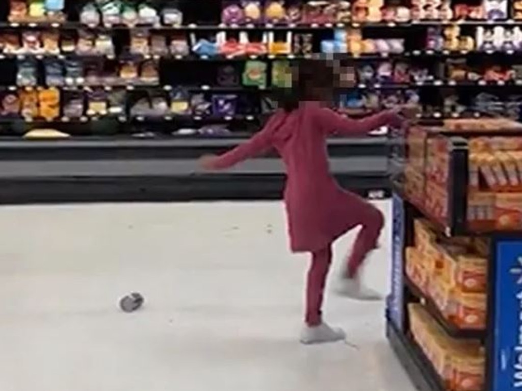 She can be seen kicking things, throwing products on the floor and smashing bottles. Picture: X