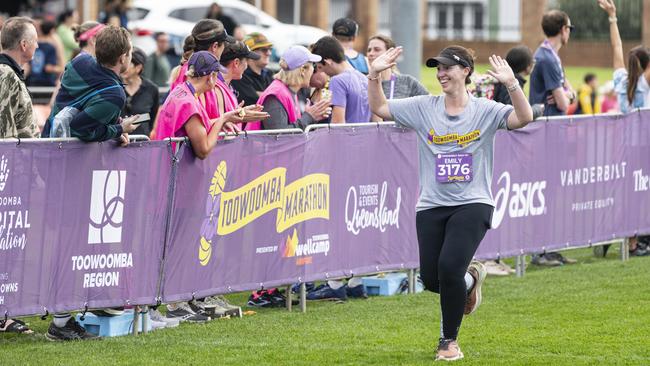 A runner in the 10km event finishes in style at the Toowoomba Marathon event, Sunday, May 5, 2024. Picture: Kevin Farmer