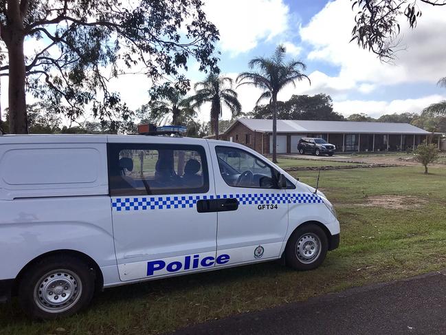 A police van outside a home in Lawrence, near Grafton. Picture: Nathan Edwards