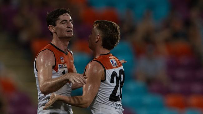 Scott Carlin and Seth Harris celebrate as the NTFL Buffaloes' mens side beat the Essendon Bombers. Picture: Pema Tamang Pakhrin