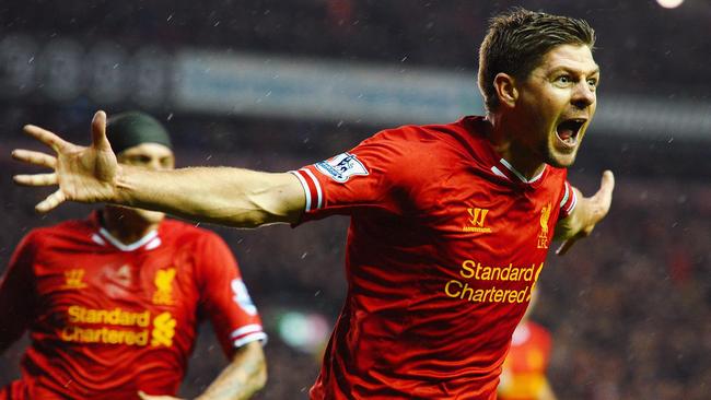 LIVERPOOL, ENGLAND - JANUARY 28: Steven Gerrard of Liverpool celebrates after scoring the opening goal during the Barclays Premier League match between Liverpool and Everton at Anfield on January 28, 2014 in Liverpool, England. (Photo by Laurence Griffiths/Getty Images)