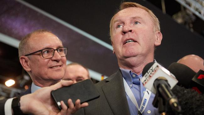 Adelaide-born NASA astronaut Andy Thomas with SA Premier Jay Weatherill, speaks to the media on Monday at the IAC. Picture: AAP / Matt Loxton