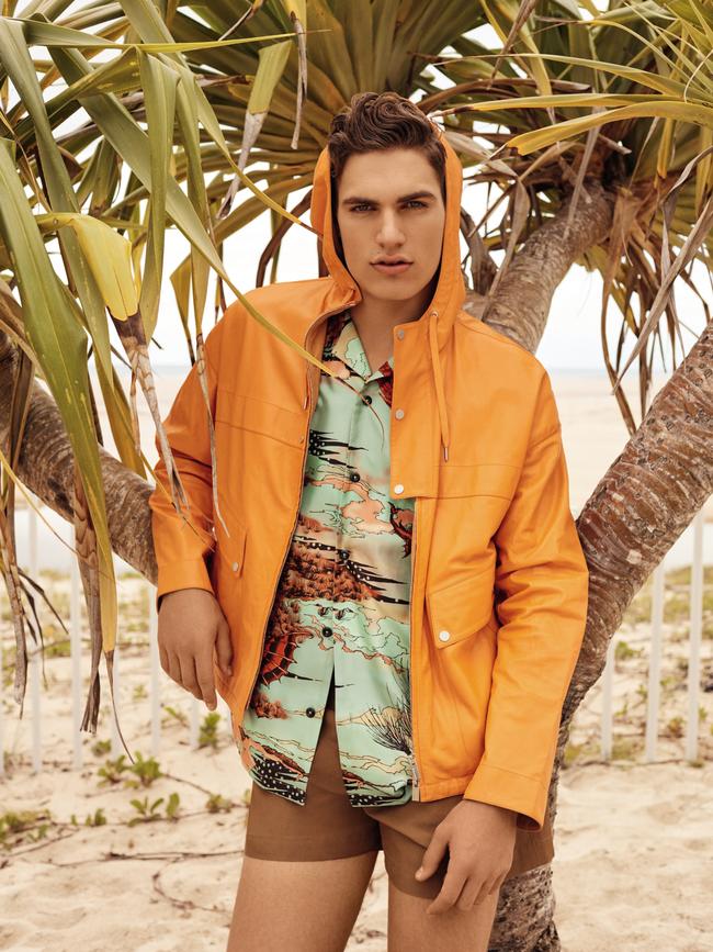 Hermes hooded leather jacket and pleat cotton shorts; Givenchy dragon-print silk shirt.